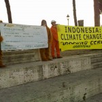 oranghi a piazza Venezia per Greenpeace